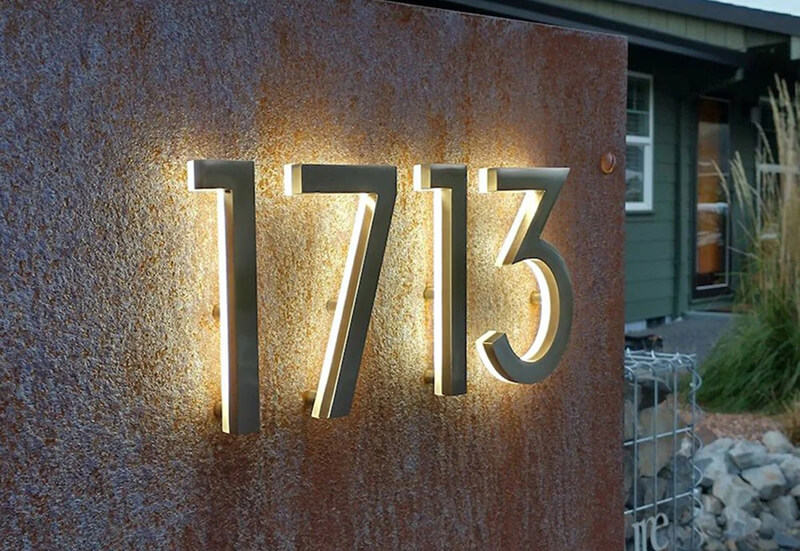 Backlit Plaques Backlit Plaques vs. Individual Numbers