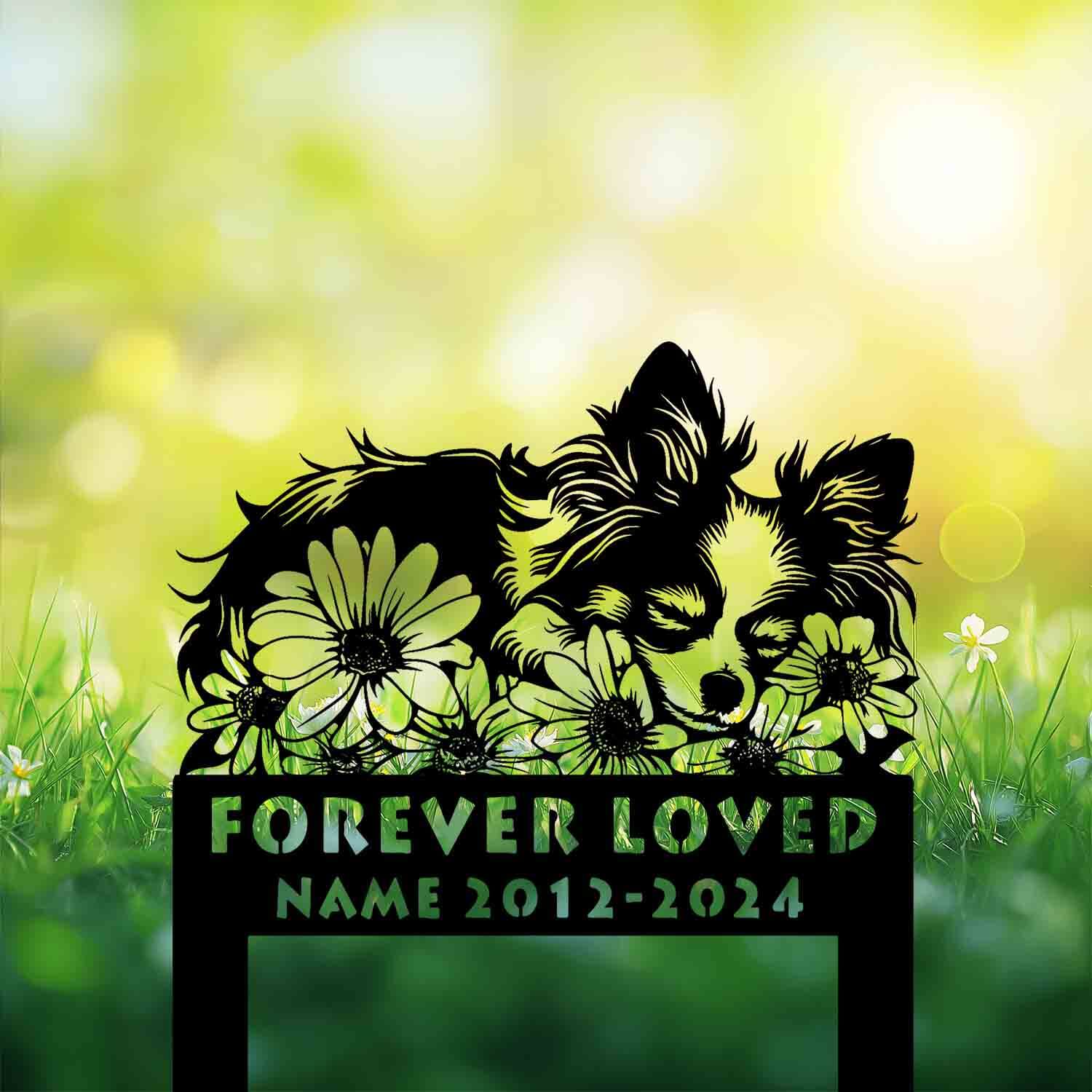 Laser-cut Papillon grave marker showing dog asleep on flowers – pet loss tribute