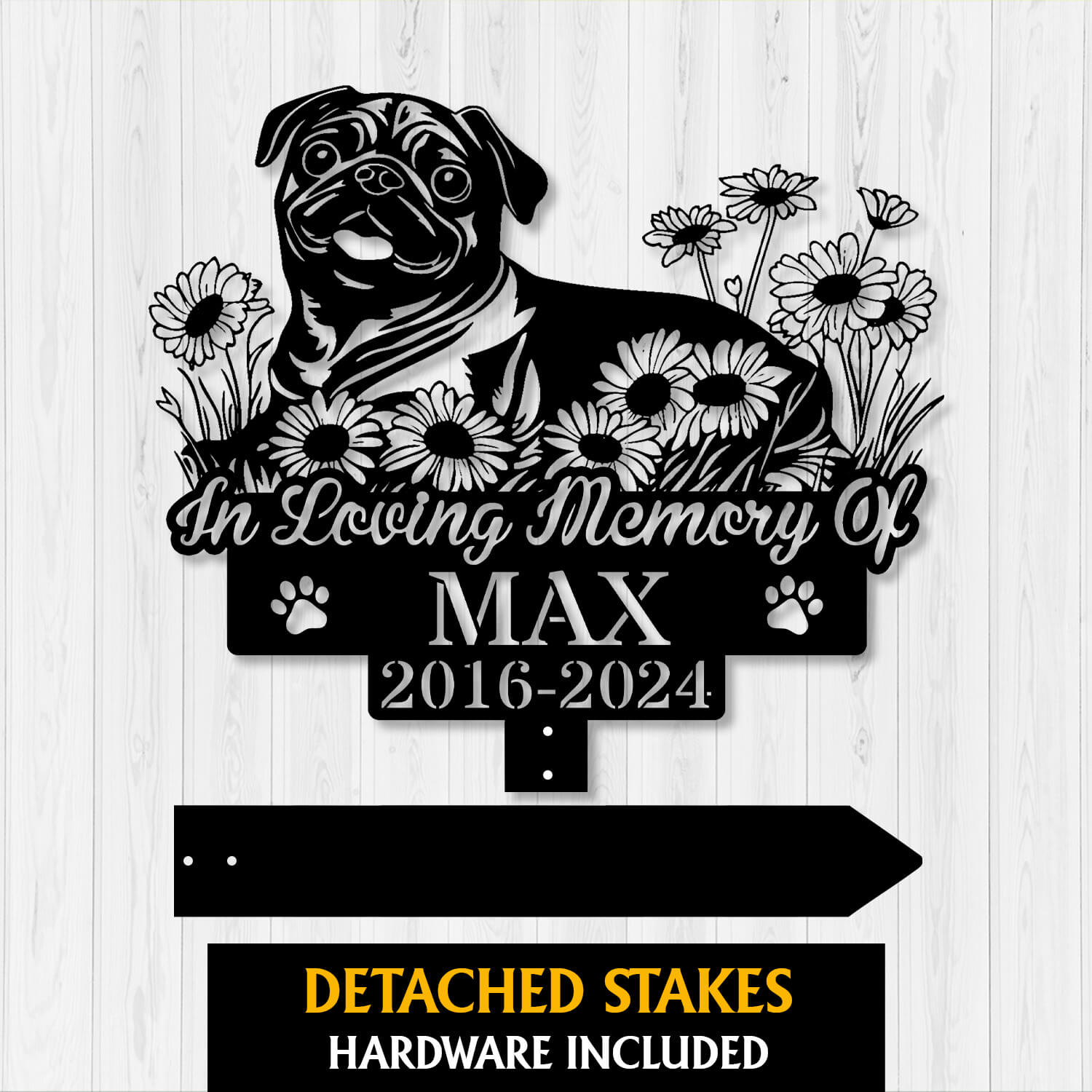 Outdoor display of Pug Dog Lying Memorial Stake in garden bed setting