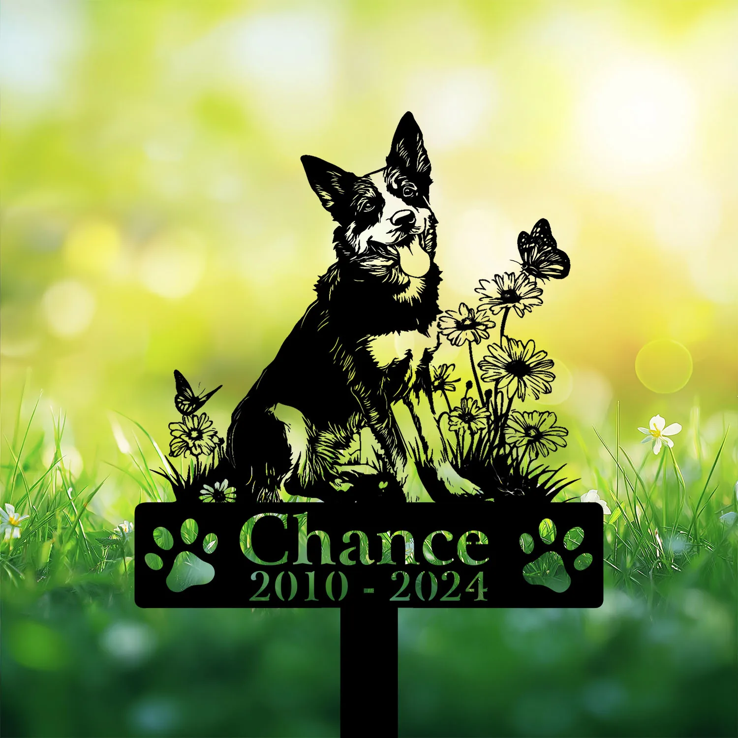 Australian-Cattle-2 Black dog memorial garden stake with flowers, butterflies, paw prints, and text “Chance 2010 - 2024” in grass
