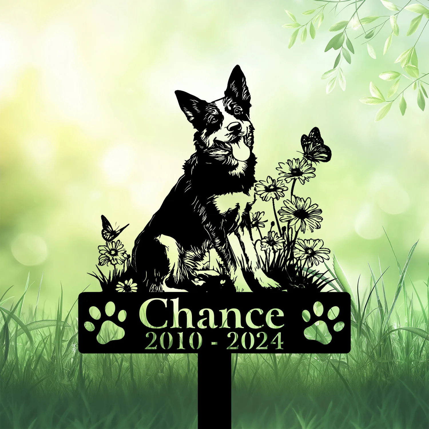 Australian-Cattle-3 Black dog memorial garden stake with flowers, butterflies, paw prints, and text “Chance 2010–2024” in grass
