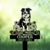 Black garden memorial stake with dog and flowers, reading In Loving Memory Of Cooper 2012-2024
