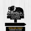 Black dog memorial garden stake sign reading In Loving Memory Of Cooper 2012-2024, with detached stakes