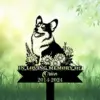A memorial sign featuring a Corgi surrounded by flowers, with the text 'In Loving Memory of Orion 2014-2024'.