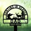 Black memorial garden stake reading “Hunting in Heaven Dad 1952-2024” with hunter, deer, and pine silhouettes