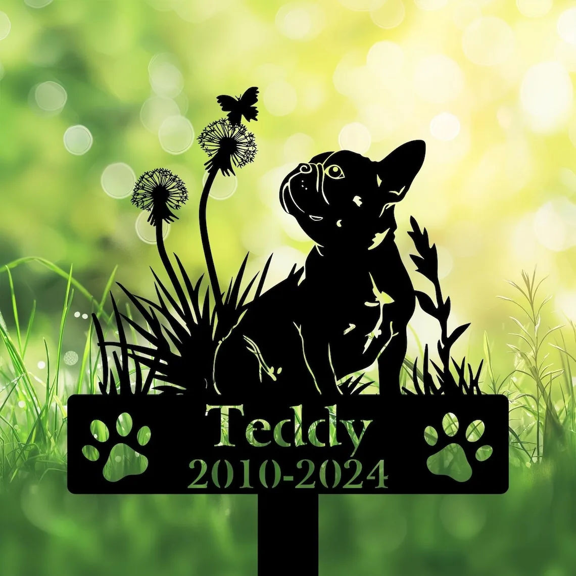A silhouette of a dog with flowers and a butterfly, featuring a sign that reads 'Teddy 2010-2024'.