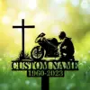 A silhouette memorial featuring a cross, a motorcycle, and a kneeling figure, with a custom name and dates.