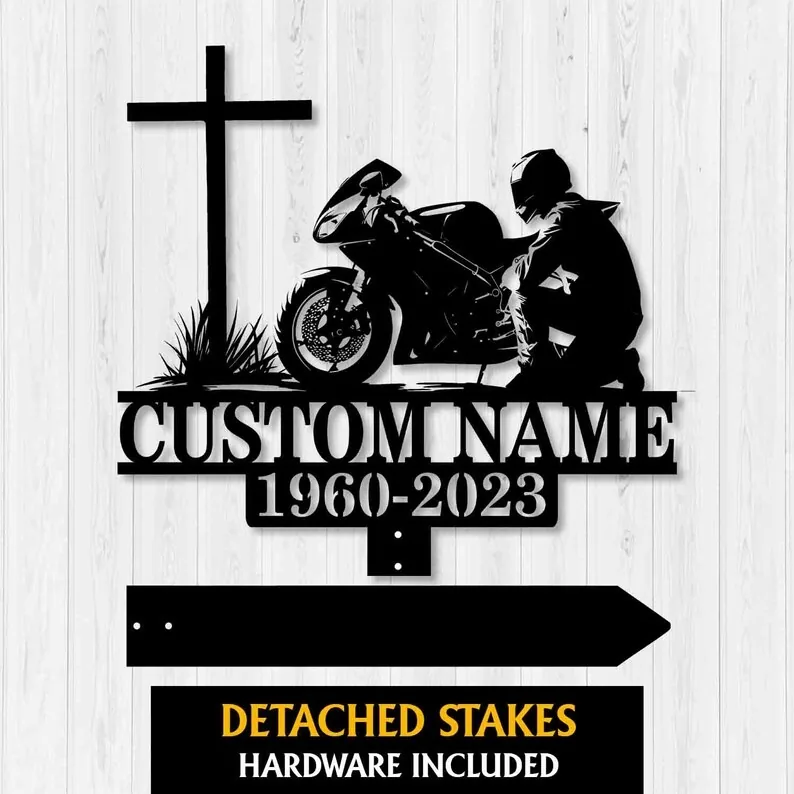 Metal memorial sign featuring a motorcycle and a cross, customizable with name and dates, with detached stakes included.