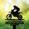Dirt bike rider memorial garden stake reading “Forever Loved Custom Name 1960-2024” in grass