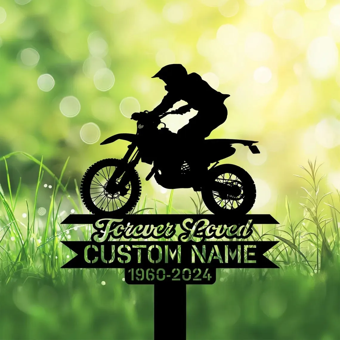 Dirt bike rider memorial yard stake in grass, with text Forever Loved CUSTOM NAME 1960-2024.