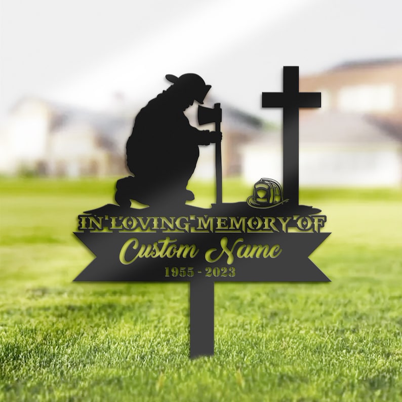 Firefighter Kneeling at Cross Memorial Grave Marker Firefighter Kneeling at Cross Memorial Grave Marker