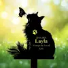 Silhouette of a cat with a butterfly, text reads '2015-2025 Layla Always be loved' on a soft green background.