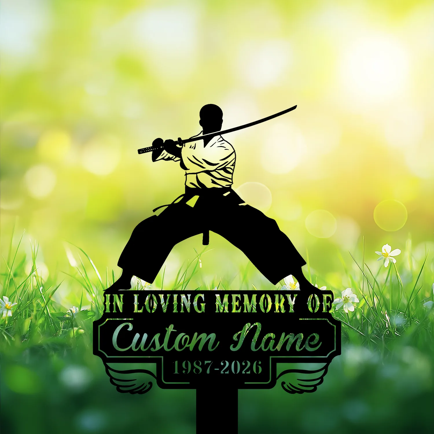 Silhouette of a sword-wielding martial artist above a memorial plaque reading "In Loving Memory of Custom Name 1987-2026" against a sunlit grassy background