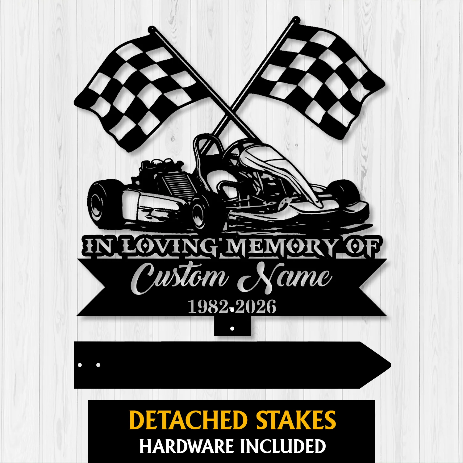 10a-2 Black metal memorial sign with crossed checkered racing flags and a go-kart illustration, text reading "In Loving Memory of Custom Name 1982-2026" against a light wood background