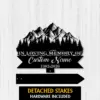 11a Black metal memorial sign silhouette of mountains and pine trees on white wood background reading "In Loving Memory of" with placeholder "Custom Name" and dates 1982-2026, detached stakes shown
