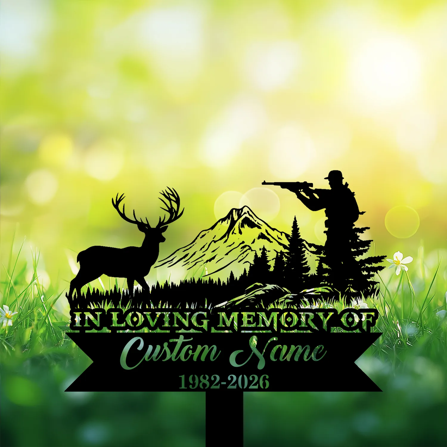Black memorial yard sign silhouette of a hunter aiming a rifle, a deer, mountain and trees with text reading "In Loving Memory of Custom Name 1982-2026" against a bright green bokeh meadow background