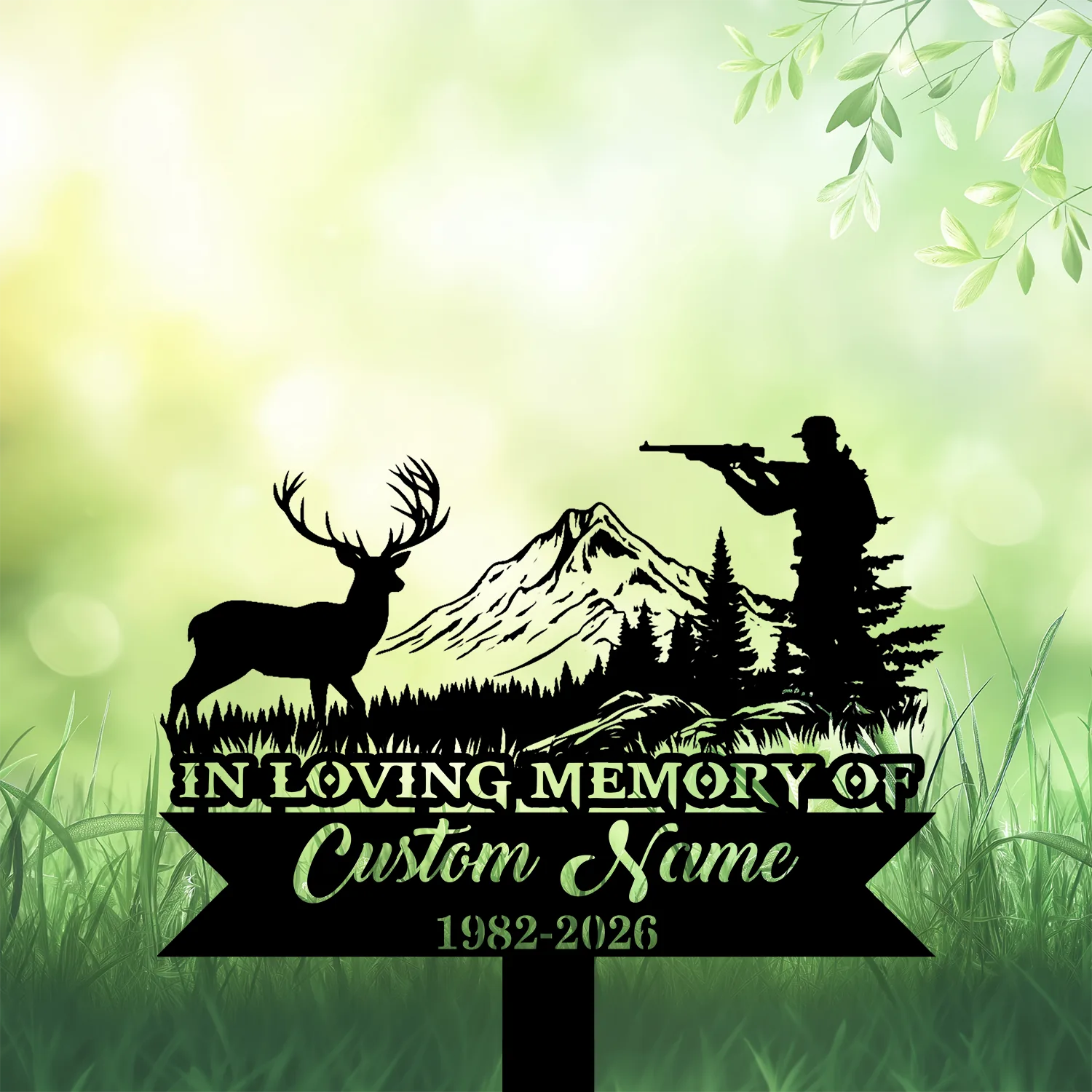 Black silhouette memorial sign with a hunter aiming a rifle at a mountain scene and a standing stag, text reads 'IN LOVING MEMORY OF Custom Name 1982-2026' against a soft green grassy background