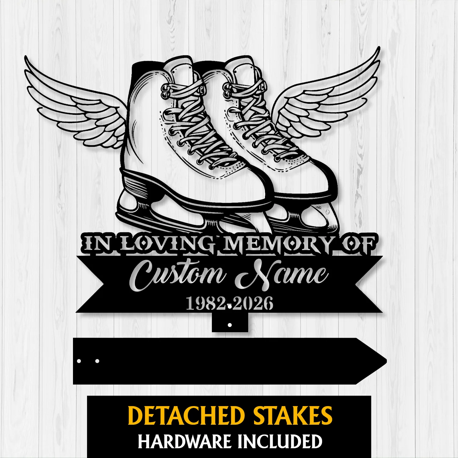Black silhouette memorial sign showing winged ice skates above text “In Loving Memory Of” and a customizable name with dates on a light wood background