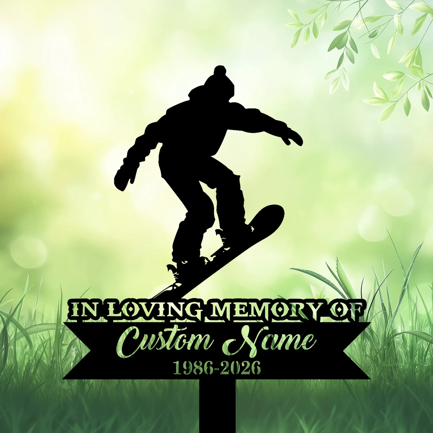 Black silhouette of a snowboarder mid-jump above a memorial sign reading "IN LOVING MEMORY OF" and placeholder "Custom Name 1986-2026" on a soft green, nature background