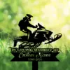 Silhouette of a person riding a snowmobile above text reading "In Loving Memory" and placeholder "Custom Name 1986-2026" against a sunlit green bokeh and grassy background