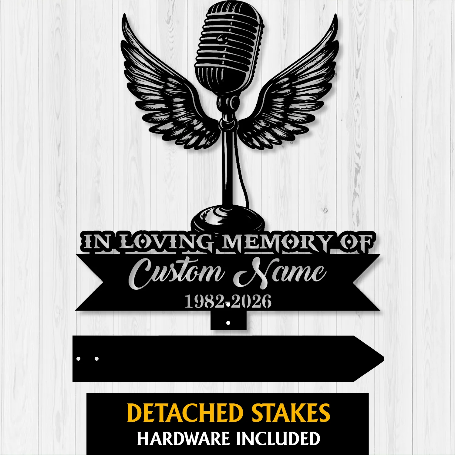 18a-1 Black metal memorial sign with a vintage microphone with wings above a ribbon reading "In Loving Memory of Custom Name" and dates "1982-2026" on a white wood background