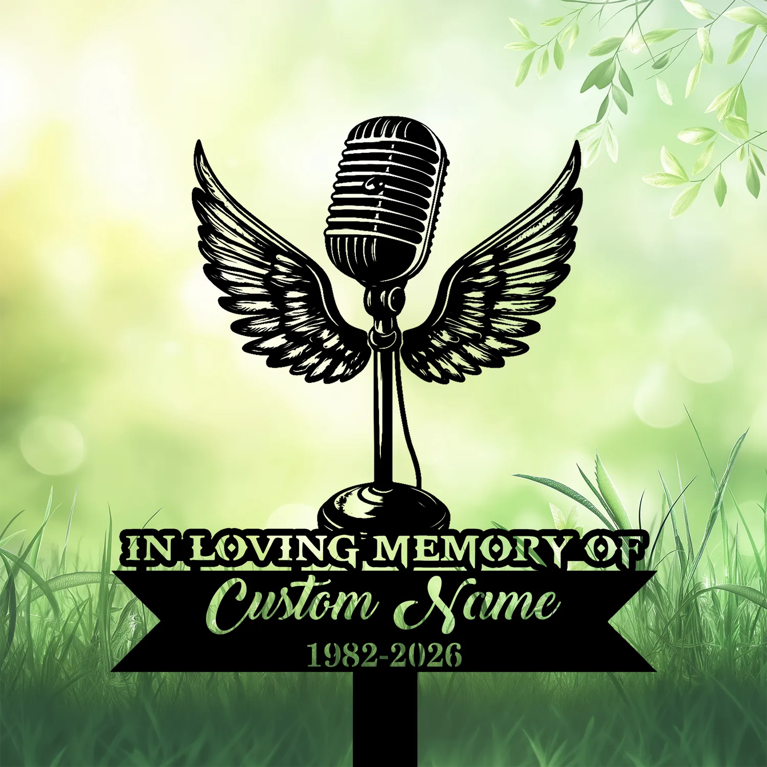 18b-1 Black vintage microphone with angel wings over grass background and banner reading "In Loving Memory" and placeholder "Custom Name 1982-2026"