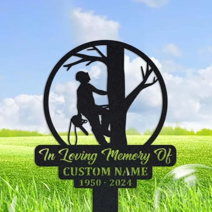 192 Black metal memorial garden stake with silhouette of a tree climber holding a chainsaw and text reading "In Loving Memory Of" and "CUSTOM NAME 1950 - 2024" set against a grassy field