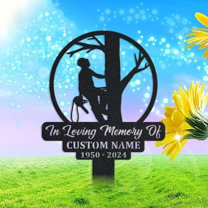 193 Outdoor black memorial yard sign showing a tree-climber silhouette with text “In Loving Memory Of,” customizable name and years (1950–2024) against a bright sky and grass