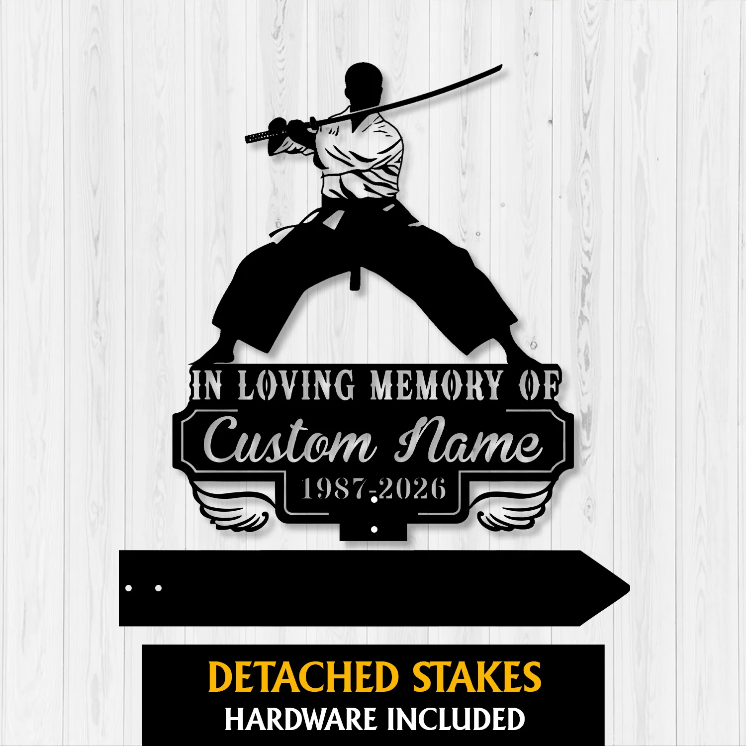 Black silhouette metal memorial sign of a kneeling samurai with katana above text 'In Loving Memory Of Custom Name 1987-2026' on a white wood plank background