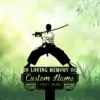 Silhouette of a samurai in a wide stance holding a katana above a memorial sign reading 'IN LOVING MEMORY OF' and 'Custom Name 1987-2026' against a soft green grassy background