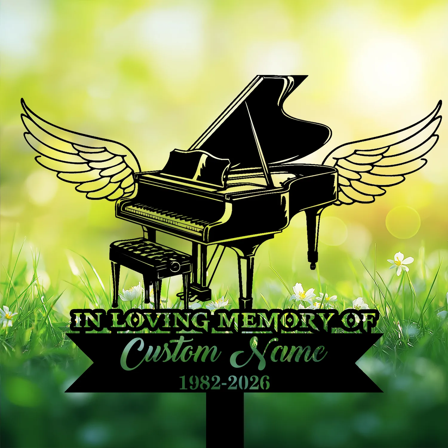 Black silhouette of a grand piano with angel wings over a grassy, sunlit background and text reading "IN LOVING MEMORY" and placeholder "Custom Name 1982-2026"