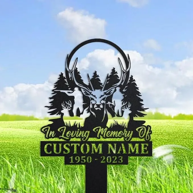 203 Black metal memorial yard sign with a deer head and pine trees silhouette reading "In Loving Memory Of" and placeholder "CUSTOM NAME 1950-2023" staked in a grassy field
