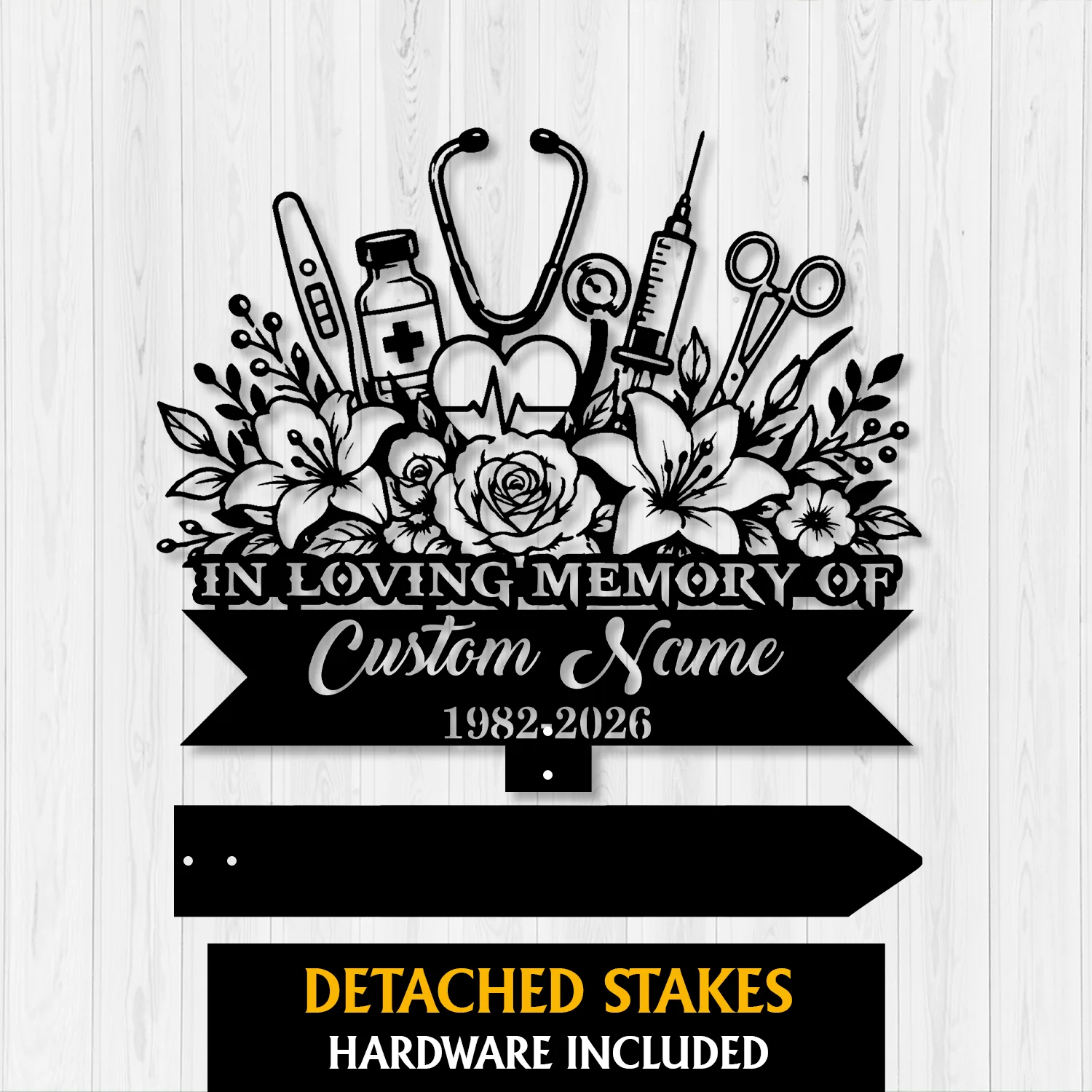 Black silhouette memorial sign with flowers, medical icons (stethoscope, syringe, vial, thermometer, scissors), text "IN LOVING MEMORY OF Custom Name 1982-2026" on a light wood background