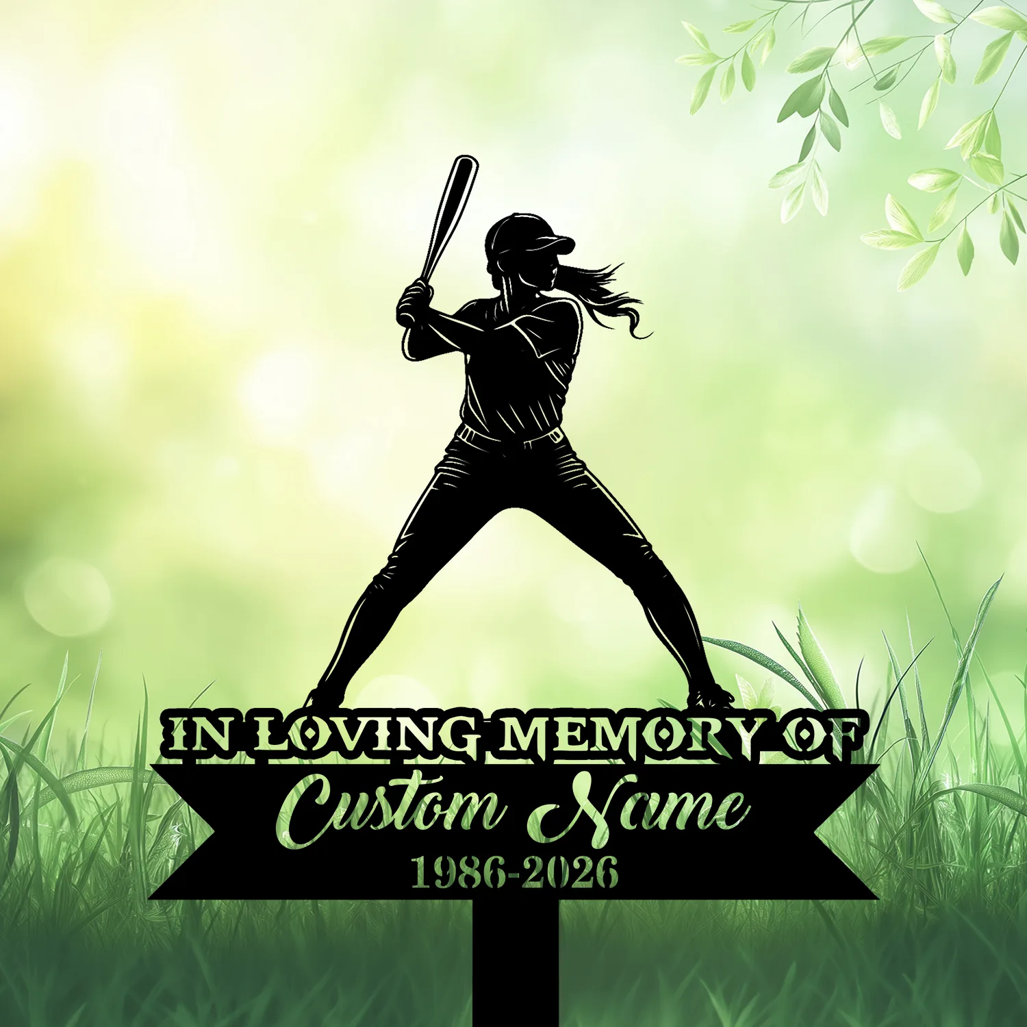 Silhouette of a female baseball batter over a memorial sign reading "IN LOVING MEMORY OF" with placeholder "Custom Name" and dates "1986-2026" against a soft green nature background