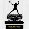Black silhouette memorial sign showing a badminton player above text ‘In Loving Memory of Custom Name 1987-2026’ on a light wood background