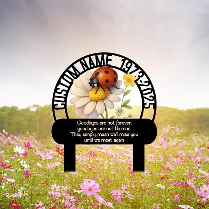Memorial garden sign mockup with a daisy and ladybug illustration, customizable name and years arched above, and a condolence inscription on a bench silhouette in a wildflower field