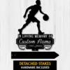 3a-1 Black silhouette of a basketball player dribbling above a memorial plaque reading "In Loving Memory of Custom Name 1987-2026" on a white wood background