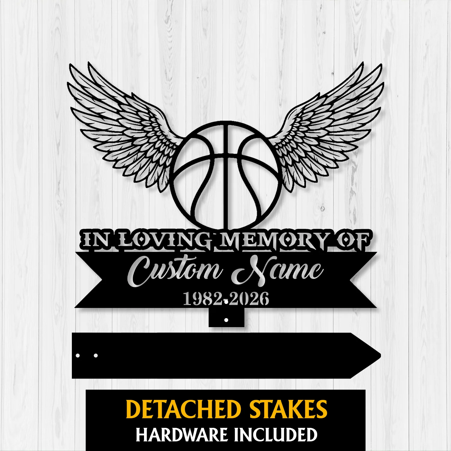 4a-3 Black metal memorial sign with a winged basketball, text 'In Loving Memory of' and placeholder 'Custom Name' with years '1982-2026' on a light wood background