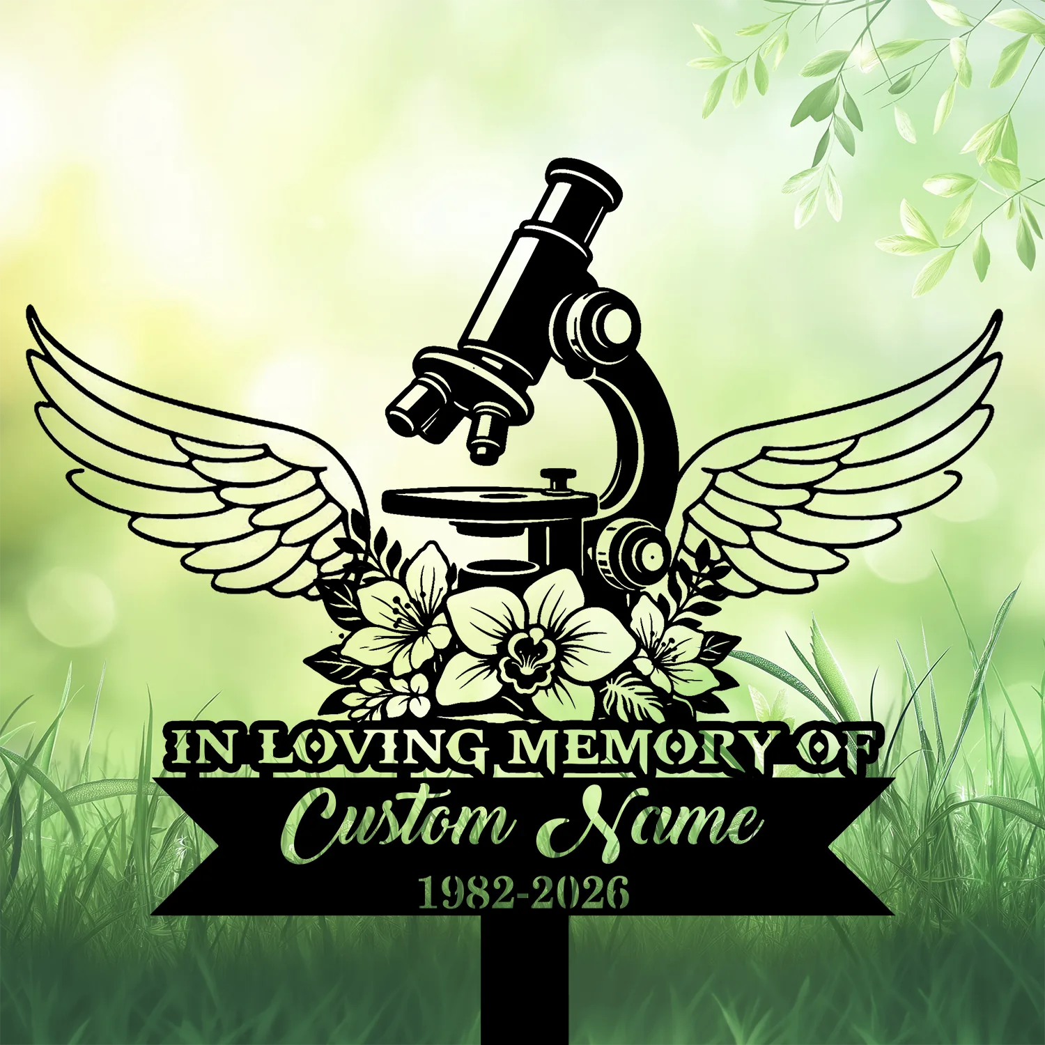 Black silhouette memorial sign with a microscope, angel wings and flowers over green blurred garden background, text reading "In Loving Memory of Custom Name 1982-2026"