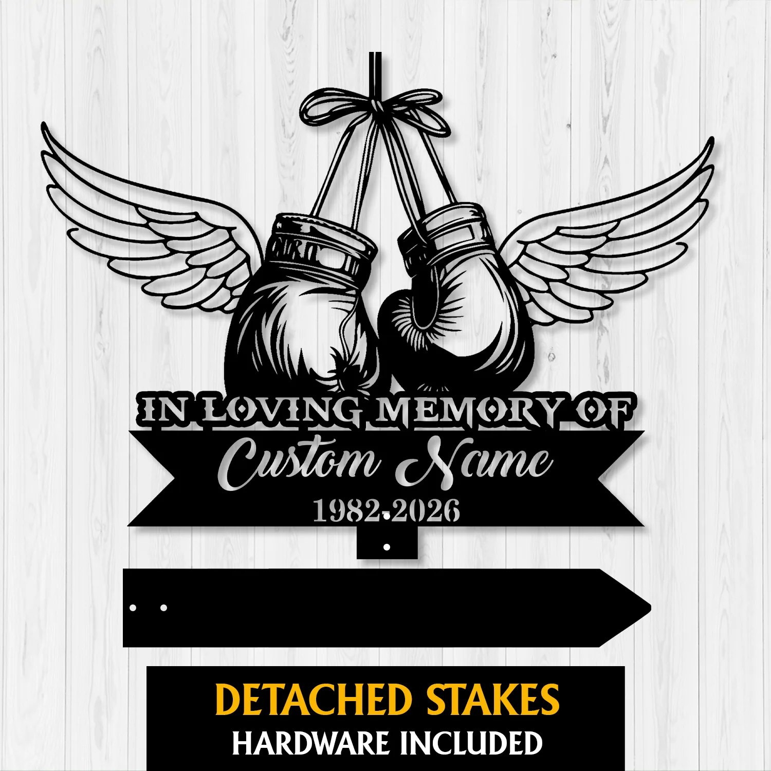 5a-3 Black metal memorial sign showing hanging boxing gloves with wings, text 'In Loving Memory Of', placeholder 'Custom Name' and years '1982-2026' on a white wood background