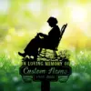 6-2 Black silhouette garden memorial sign of an elderly woman knitting in a rocking chair with flowers, text reading "In Loving Memory of Custom Name 1987-2026" against a sunlit green bokeh background