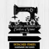Black decorative wall sign shaped like a vintage sewing machine with flowers reading "In Loving Memory of Custom Name 1982-2026" on a light wood background