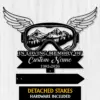 7a-4 Black memorial sign shaped like ski goggles with wings, mountain landscape inside lens, text reading "In Loving Memory of Custom Name 1982-2026" on white wood background