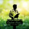 Silhouette memorial sign of a doctor with stethoscope holding a clipboard above grass and flowers, text reading "In Loving Memory of Custom Name 1987-2026"