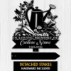 9a-2 Black metal garden memorial sign with watering can, flowers, carrots and butterflies, text reading "In Loving Memory of Custom Name 1982-2026" on a light wood background