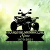 Black silhouette memorial sign of an ATV with text placeholder "In Loving Memory of Name 1970-2024" against a soft green grassy background