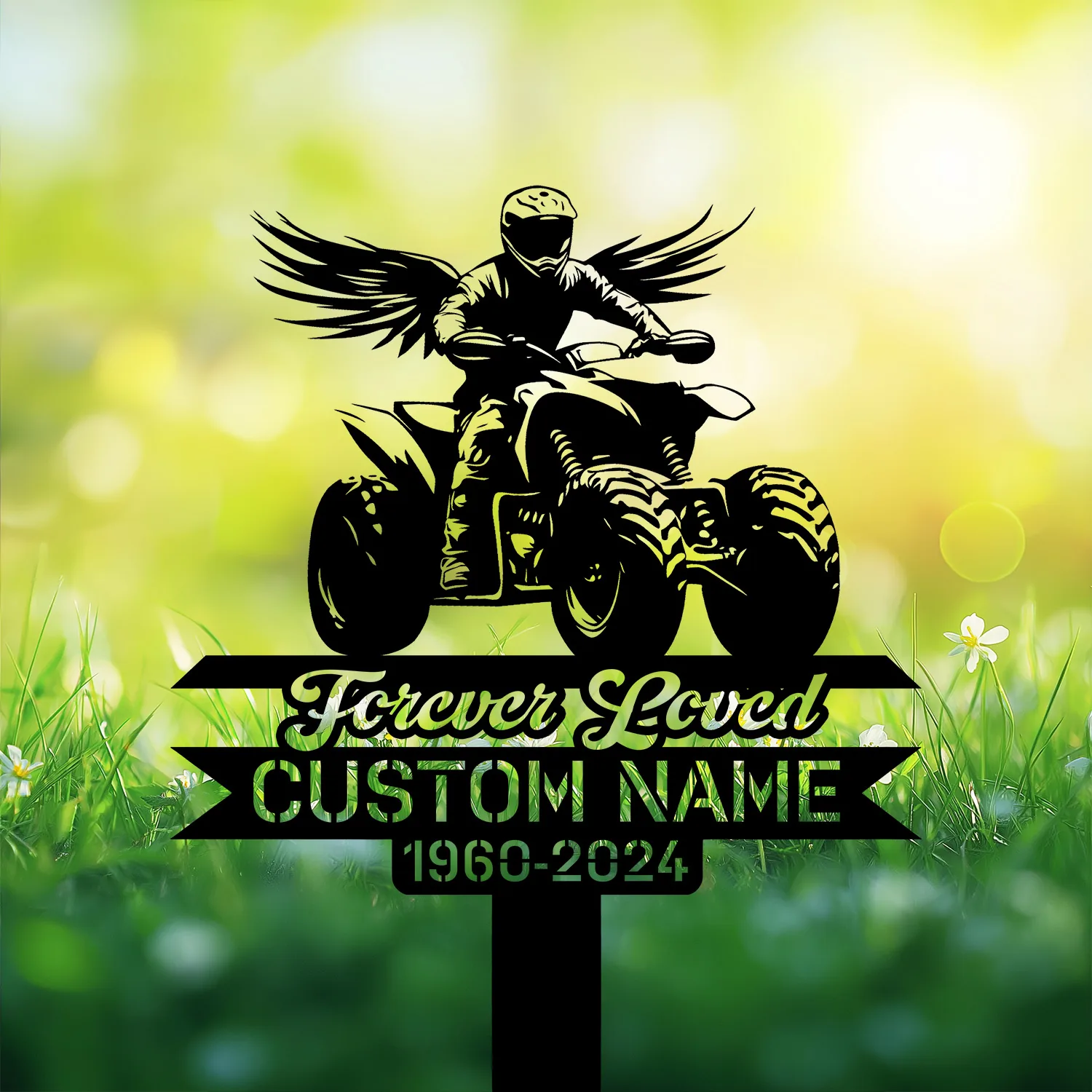 Black silhouette of a winged ATV rider above ribbon text reading "Forever Loved" and placeholder "CUSTOM NAME 1960-2024" over blurred grassy sunrise background
