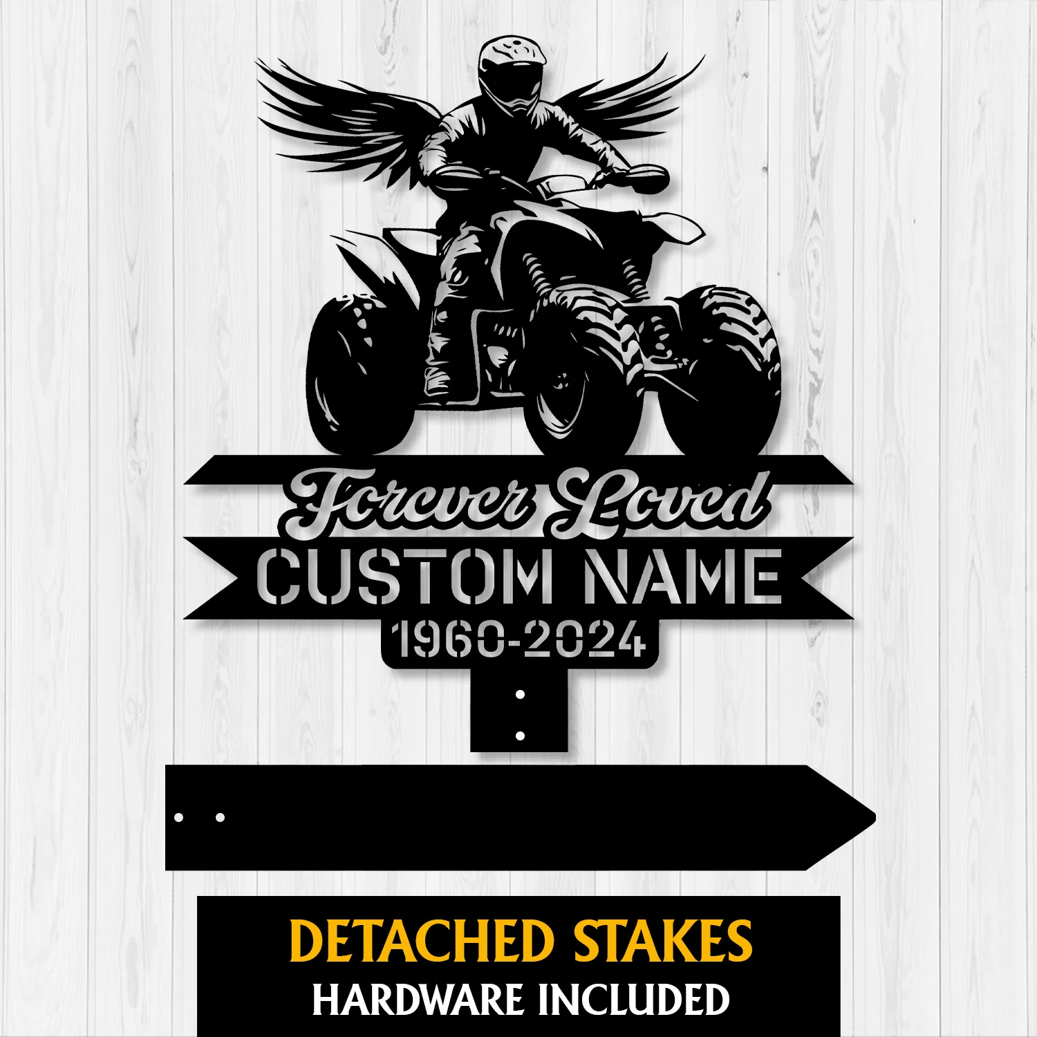 Black metal memorial sign with winged rider on an ATV, text reading "Forever Loved", placeholder "CUSTOM NAME" and dates "1960-2024" on a light wood background