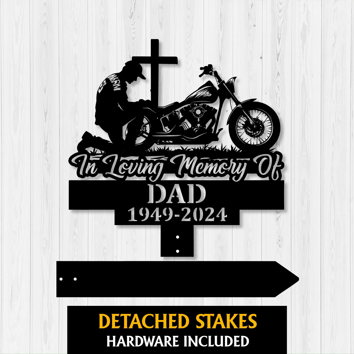 Biker-Kneeling-at-Cross-2 Black memorial sign silhouette of a kneeling motorcyclist, cross and motorcycle above text reading “In Loving Memory Of DAD 1949-2024,” shown on a light wood background