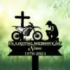Dirtbike-Racer-Kneeling-at-Cross-3 Black silhouette memorial sign with a cross, dirt bike and kneeling rider above text ‘In Loving Memory’ and placeholder name and dates on a grassy green background